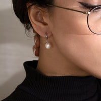 Dangling Pearl Huggies | Silver