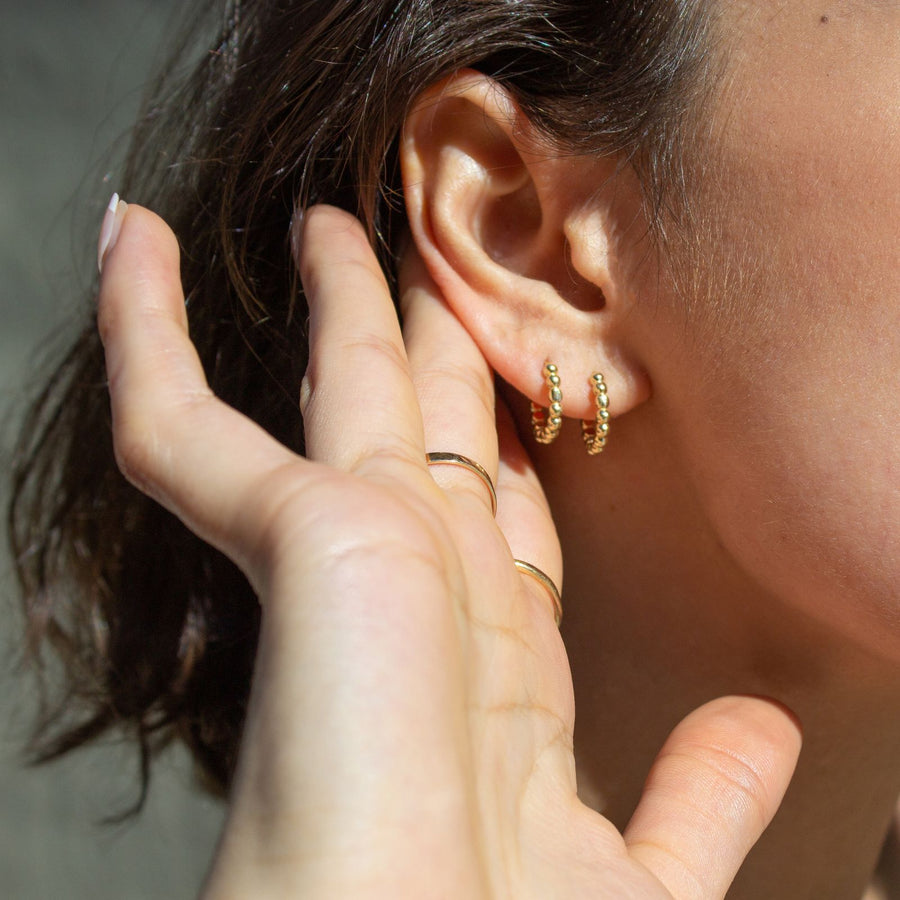 gold huggie hoop earrings