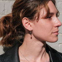 silver woman earrings onyx canada